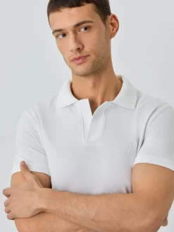 New Slim Fit Piqué Polo With Ribbed Cuba Collar In BCI Cotton Polos