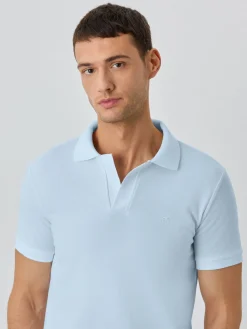New Slim Fit Piqué Polo With Ribbed Cuba Collar In BCI Cotton Polos